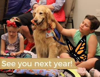 A golden retriever sits between a boy and a girl. Text says "See you next year."