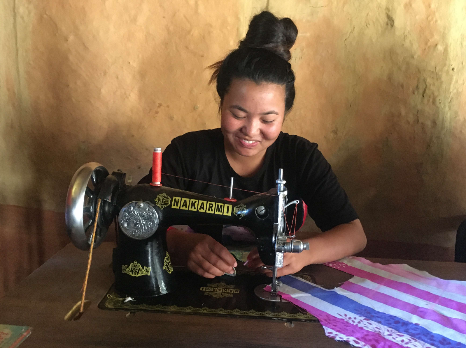 Pink with her Sewing Machine