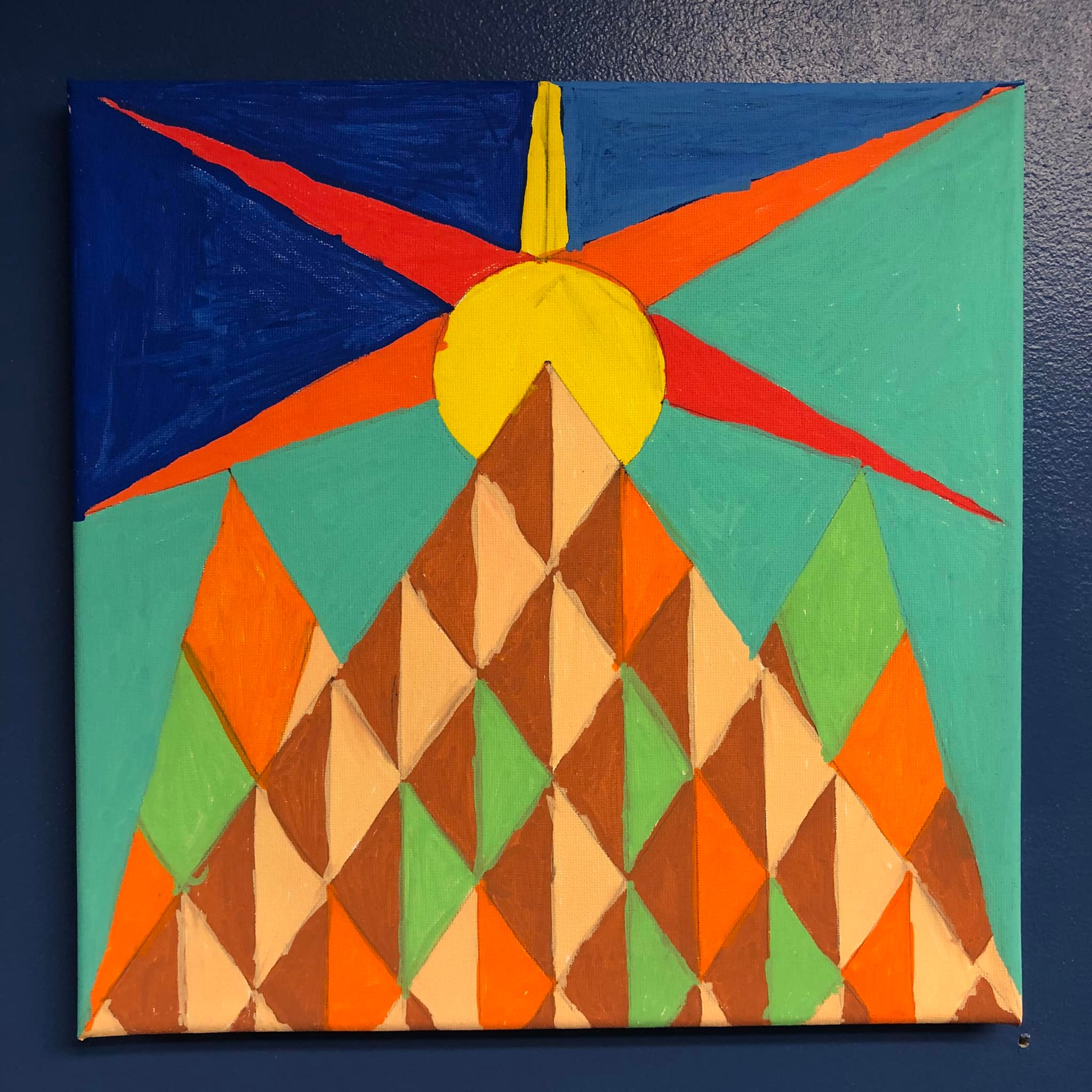 abstract painting of a mountain and sun.