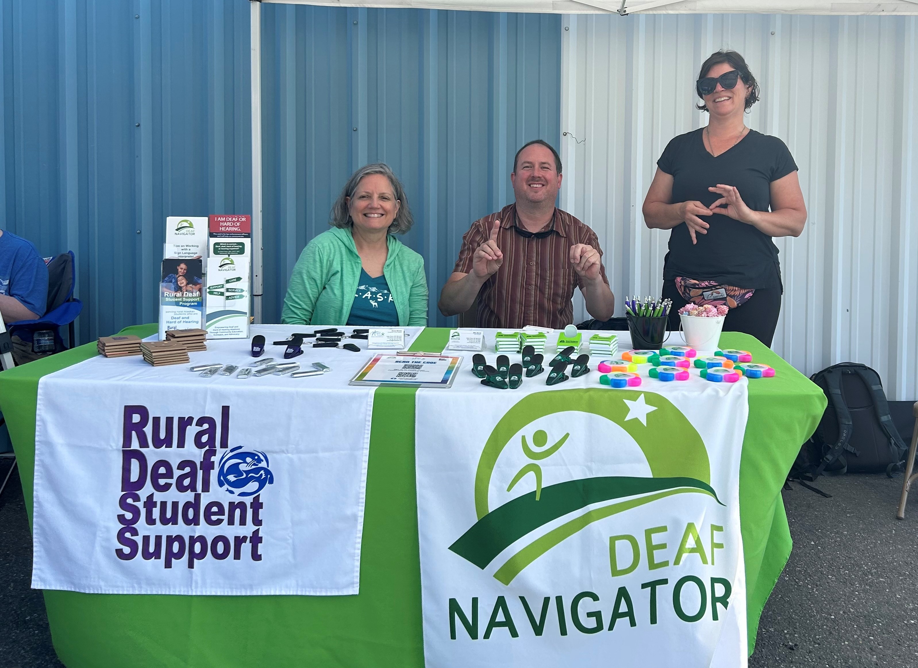 Sharon Miranda, Coordinator of Deaf Student Supports, and Michael Merritt, Deaf Navigator stand in front of a garden.
