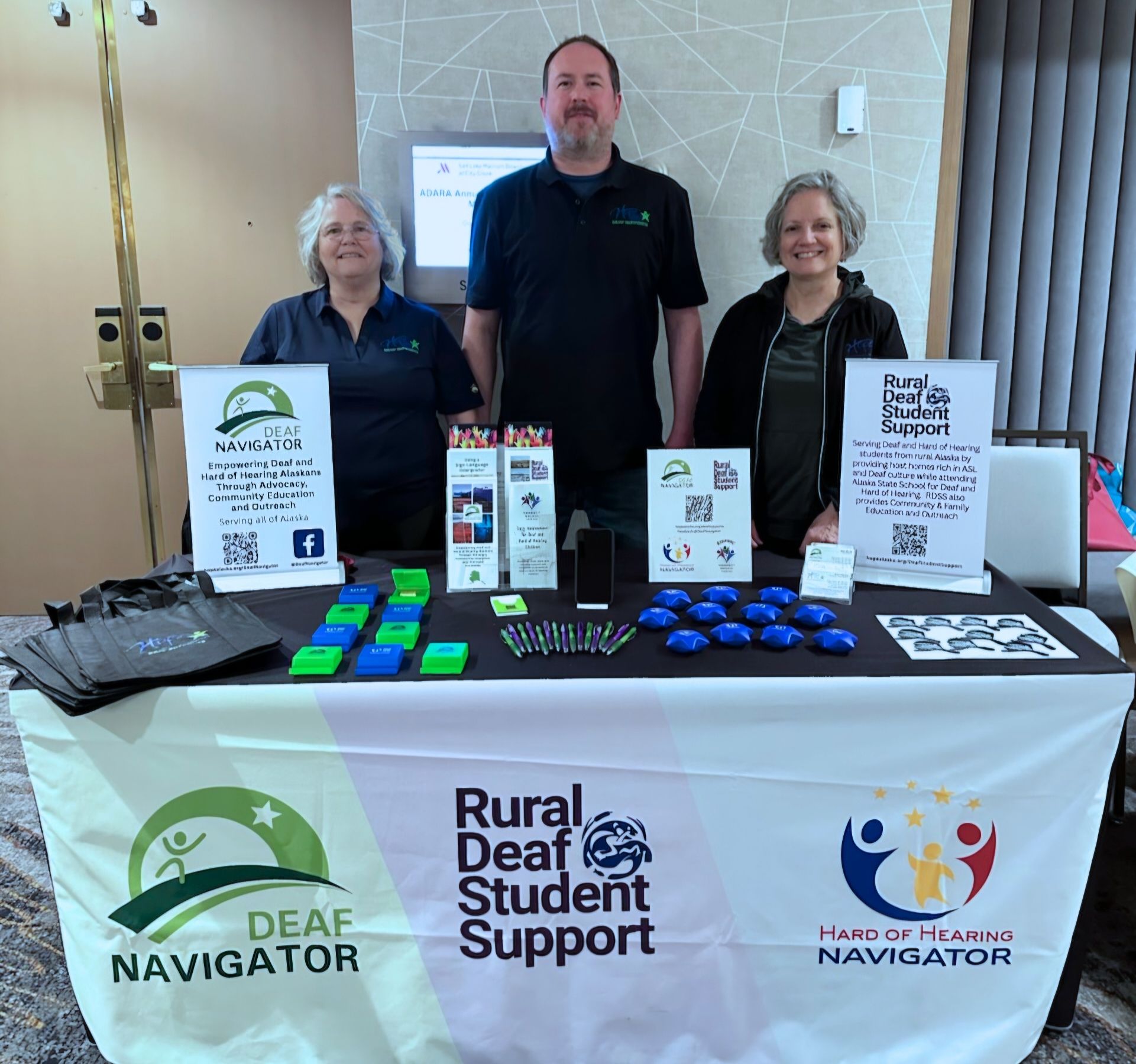Sharon Miranda, Coordinator of Deaf Student Supports, and Michael Merritt, Deaf Navigator stand in front of a garden.