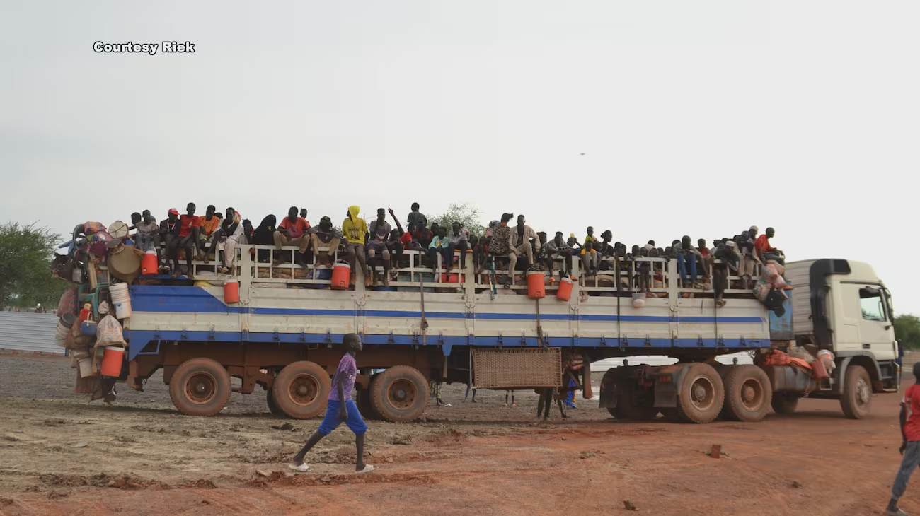 A truck in Sudan is filled with Sudanese refugees.