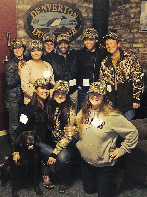 A group of female hunters enjoy the clubhouse at Denverton with California Waterfowl.