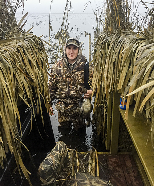 A hunter returns to the blind during a hunt with California Waterfowl.