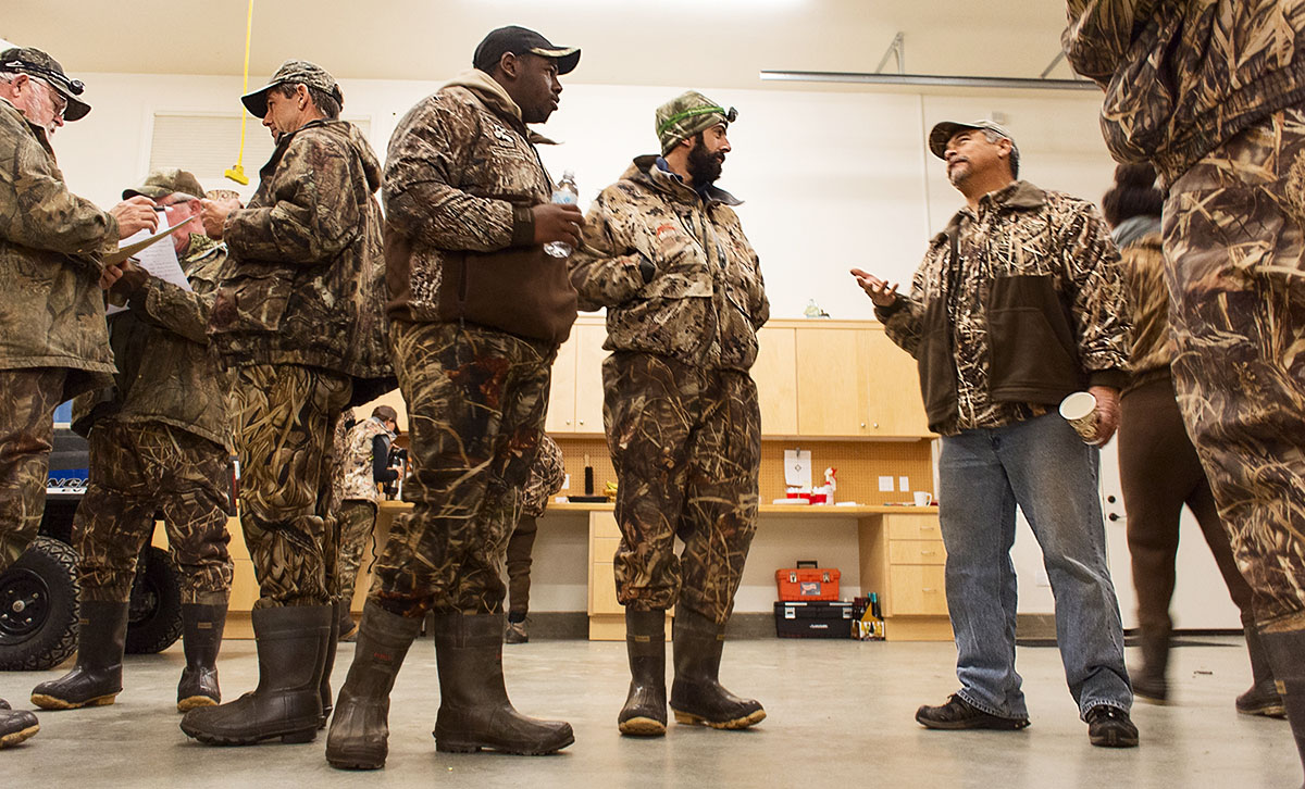 Men suited up for a duck hunt