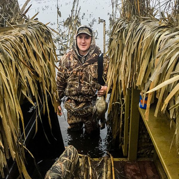 A hunter returns to the blind during a hunt with California Waterfowl.