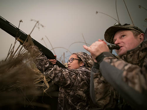 A group of female hunters enjoy the clubhouse at Denverton with California Waterfowl.