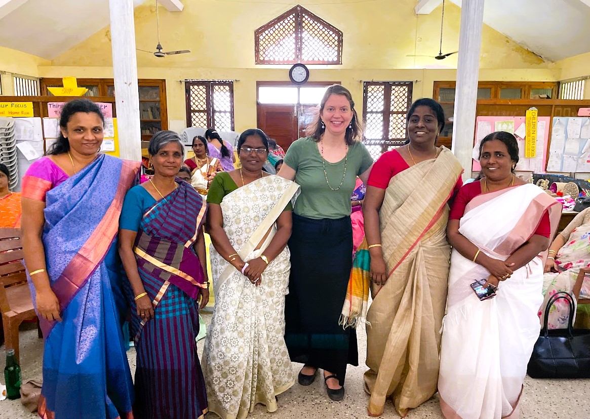 Pastor Sara Spohr stands with women leaders of the Arcot Lutheran Church in India