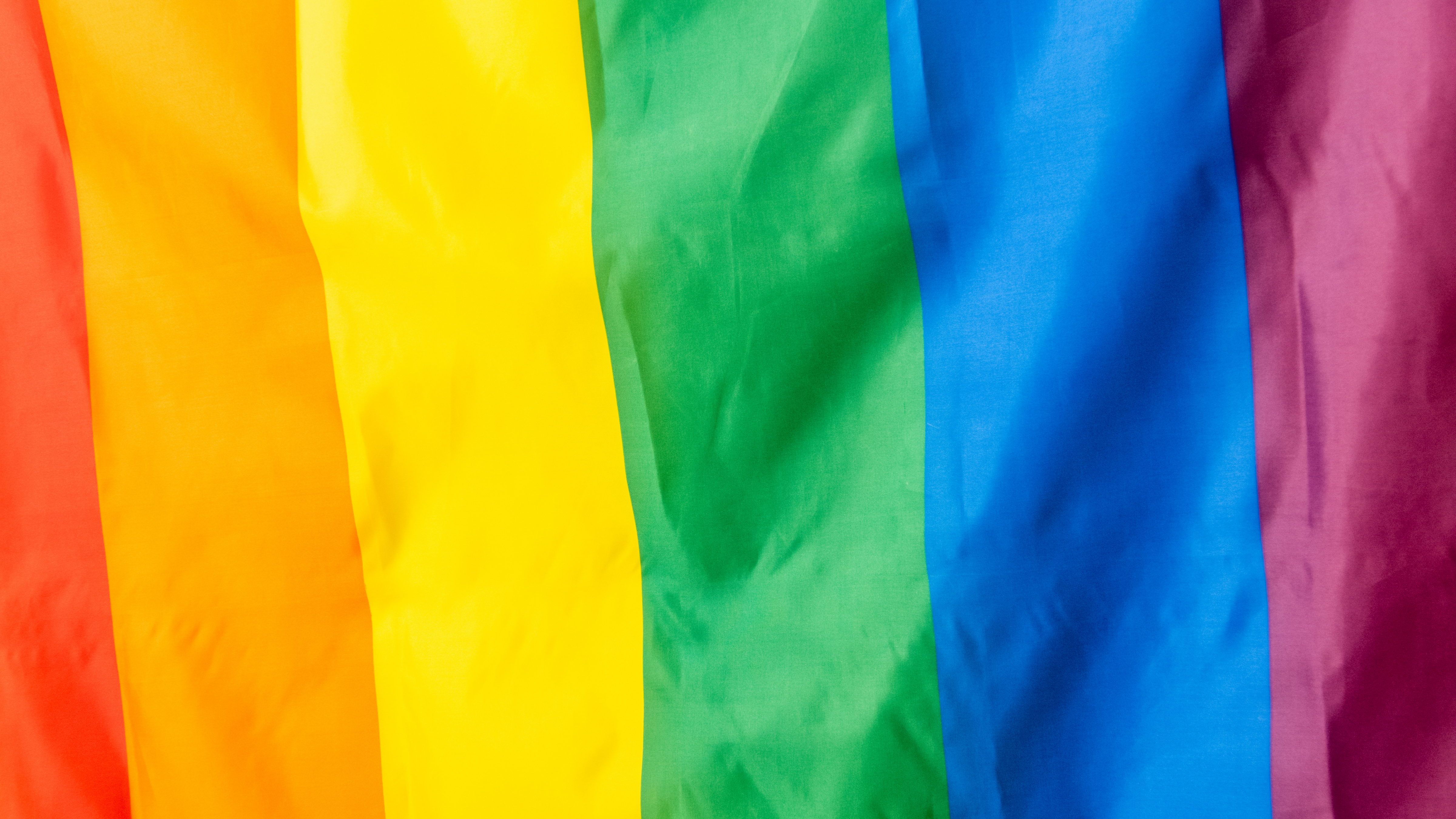 Close up image of the LGBTQ Rainbow flag
