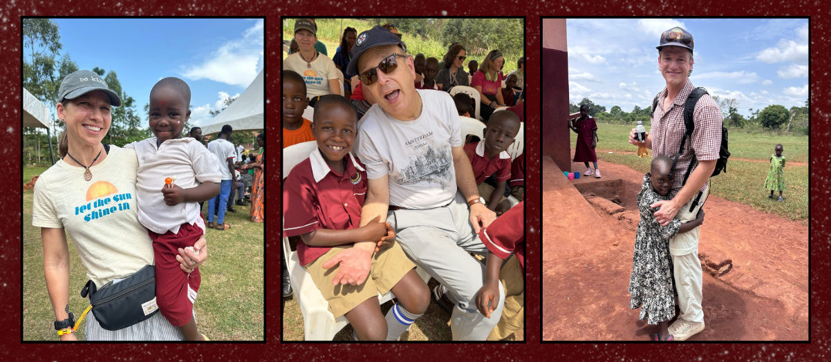 3 team members holding children in the villages