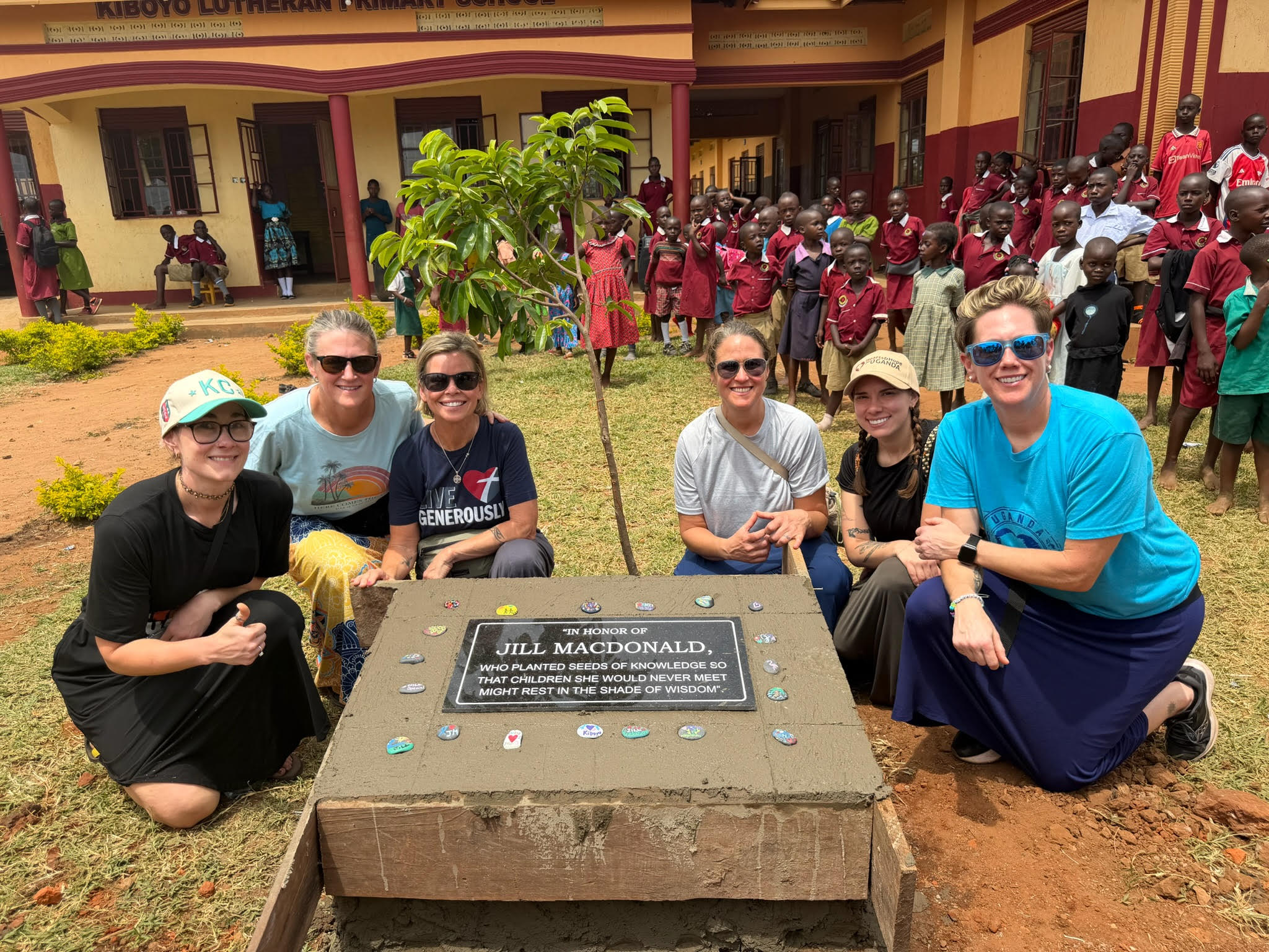 gathered around Jill's memorial stone