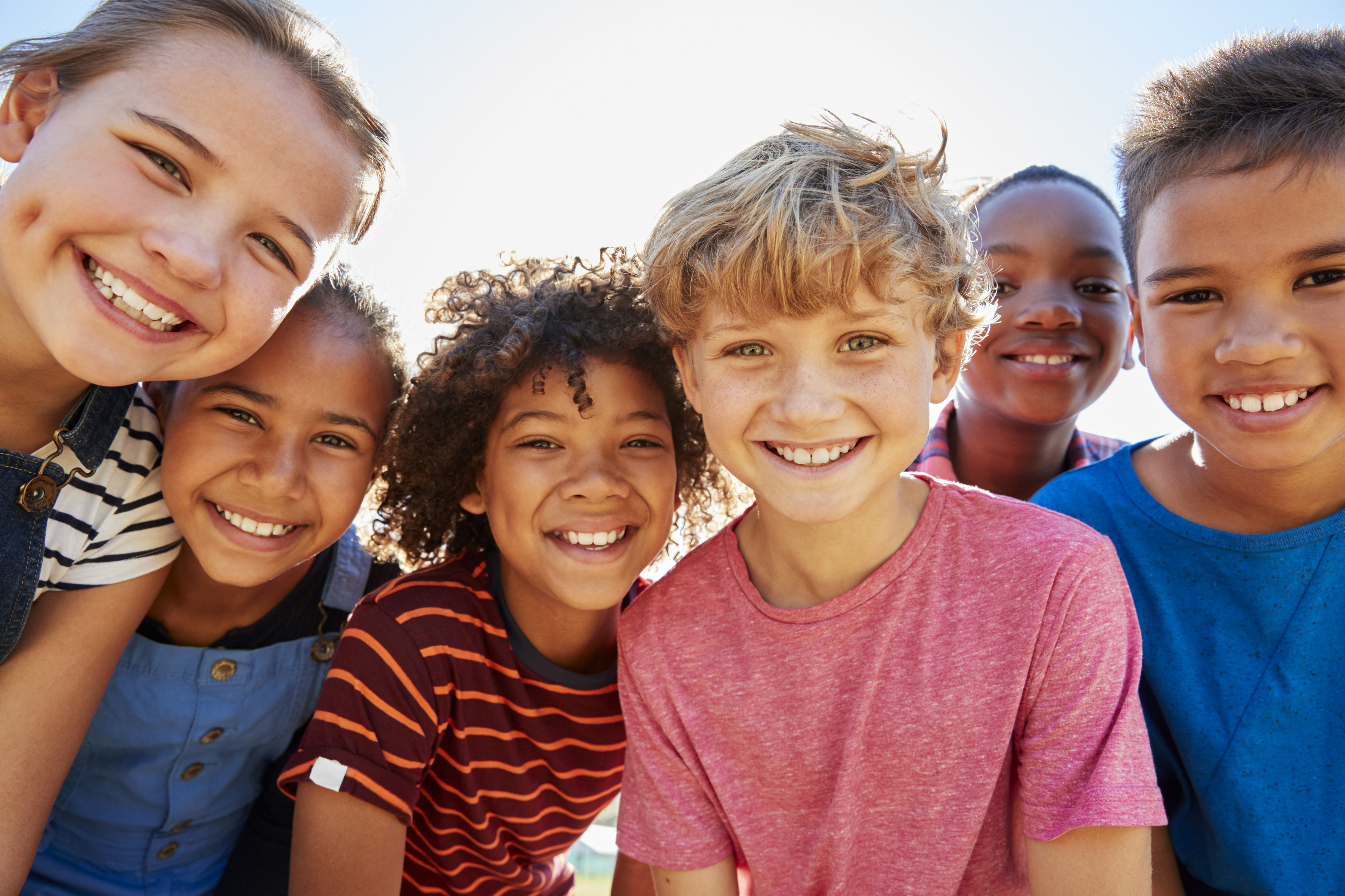 A group of children smiling