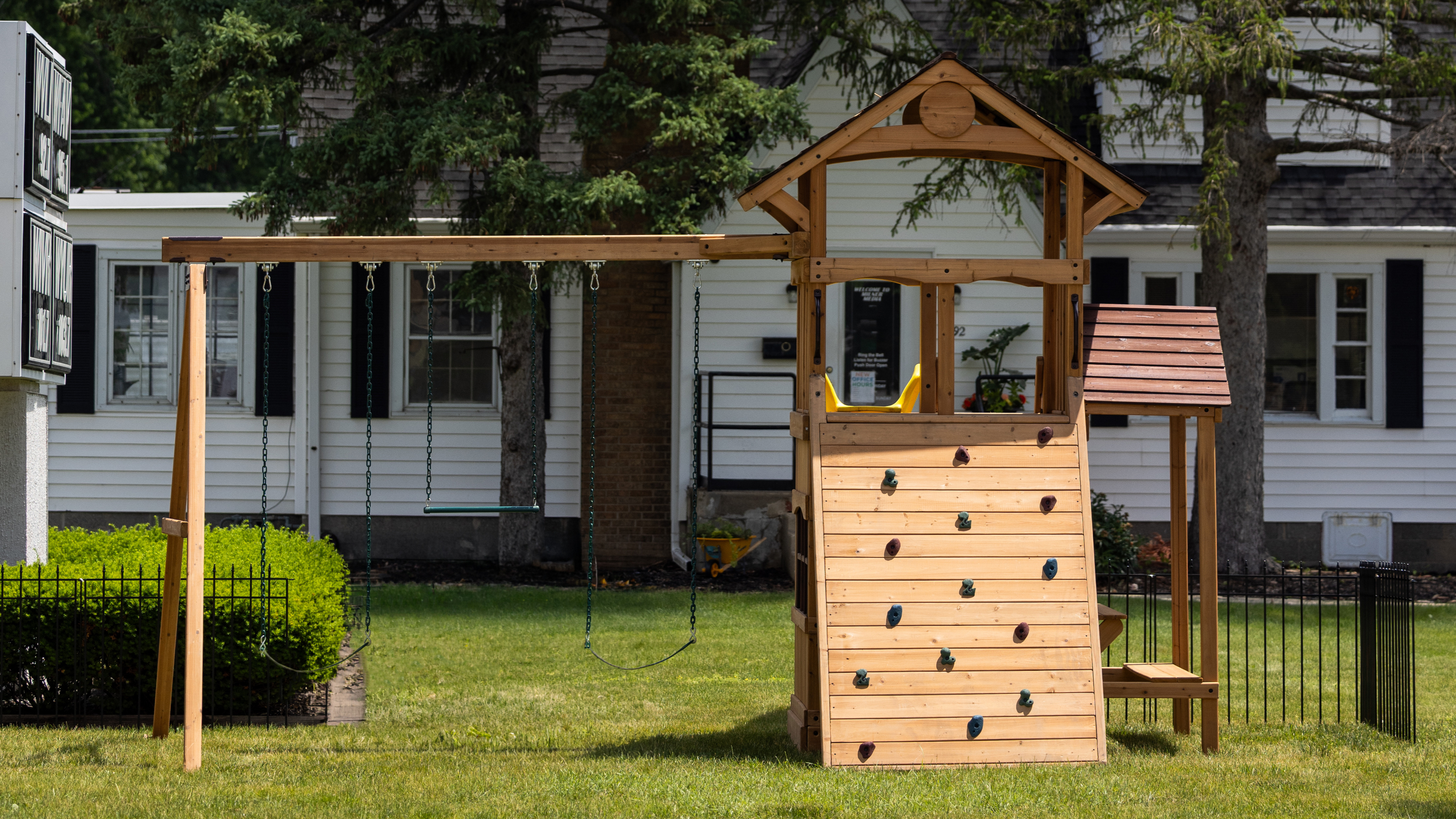 Johnson-Downs Construction Playhouse &mdash; Backyard Adventures Olympian Outlook XL 2B wooden swing set with slide, rock wall, and playhouse