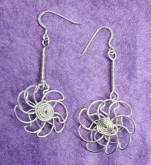 Silver Flowers representing purity, healing, and creativity