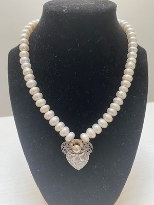 Fresh water Pearls and heart pendant
