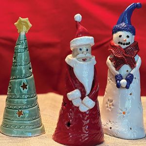 Holiday-Themed Pierced Ceramic Luminaries